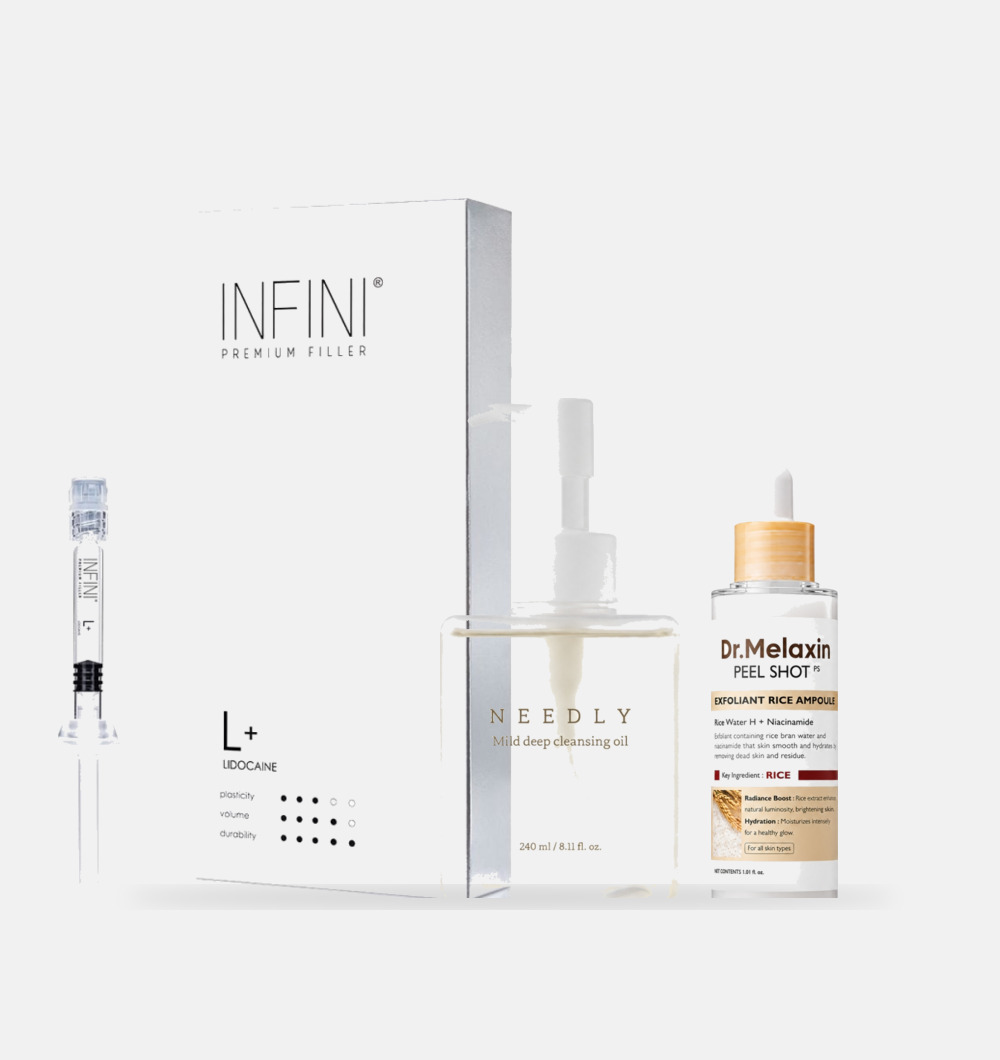 INFINI filler box with syringe, Needly cleansing oil and Dr Melaxin ampoule on grey